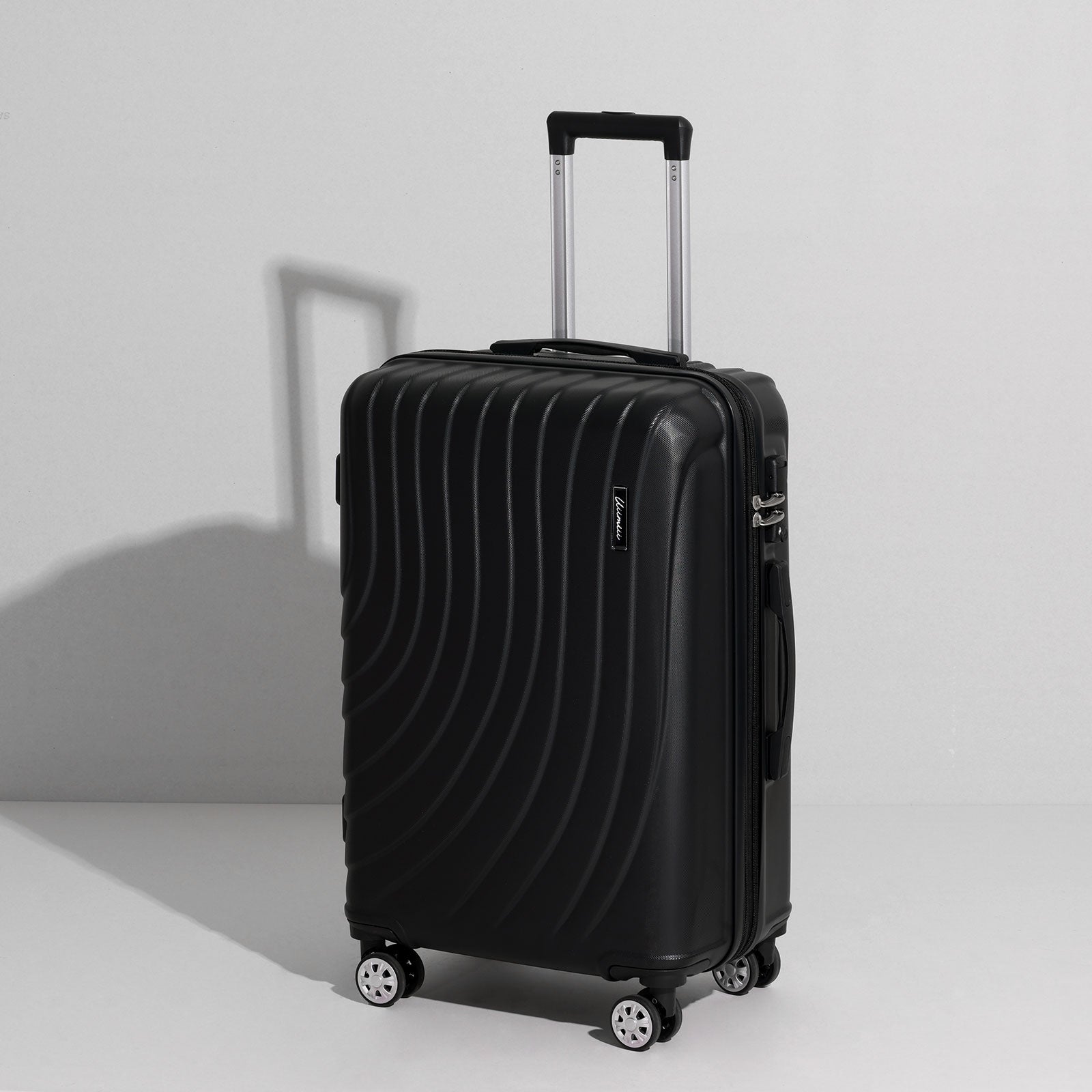 uiimiii black medium check-in luggage