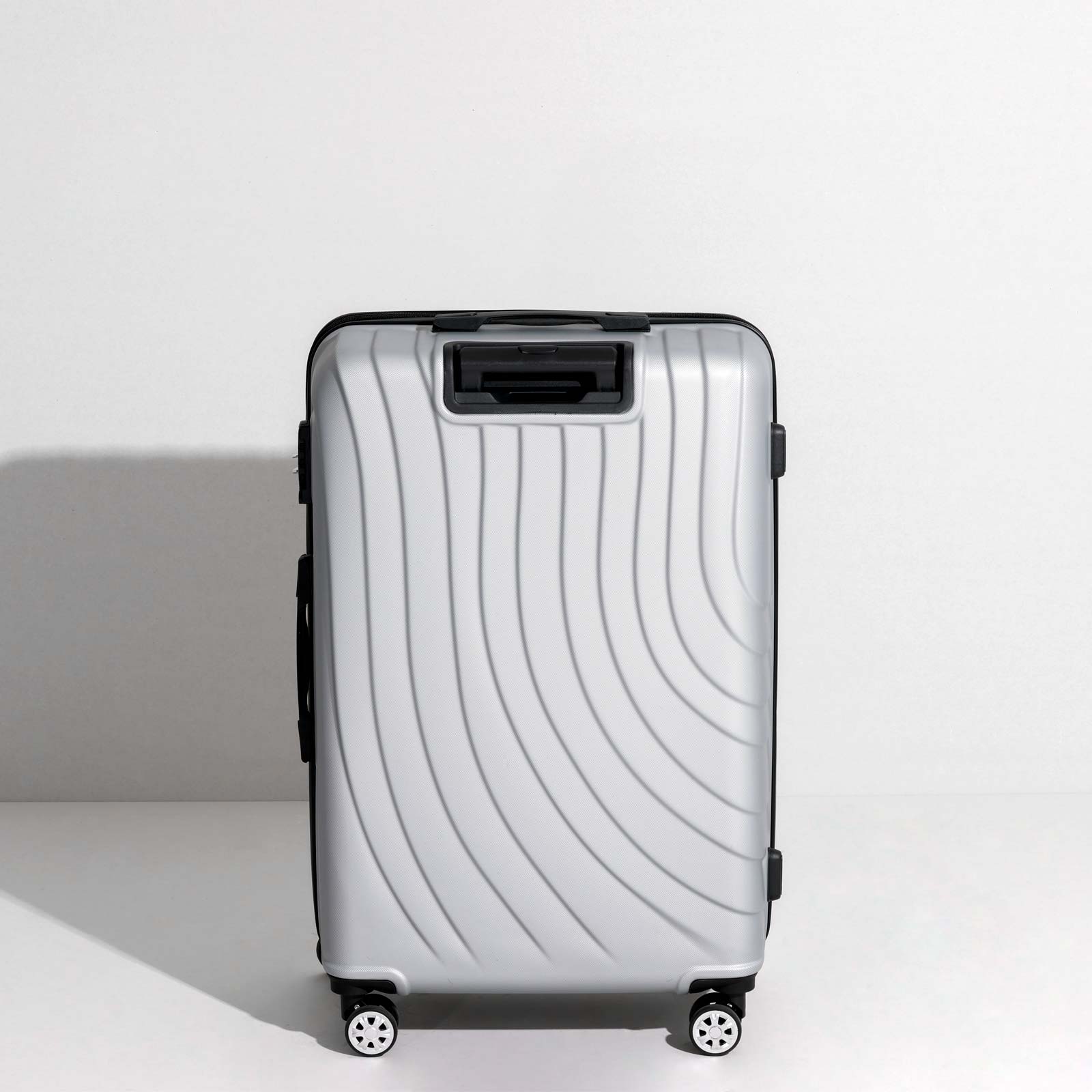 uiimiii silver large check-in luggage back