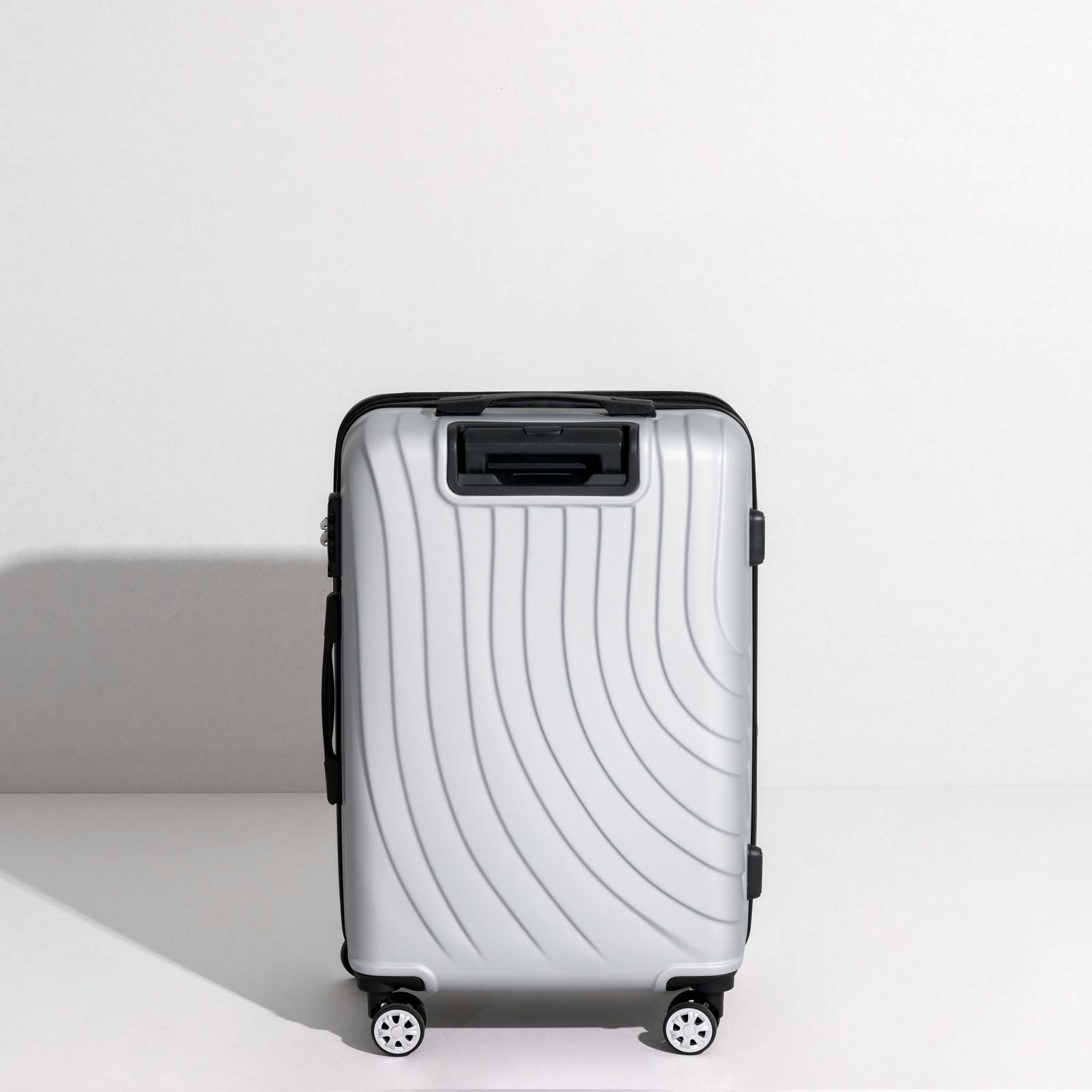 uiimiii silver medium check-in luggage back